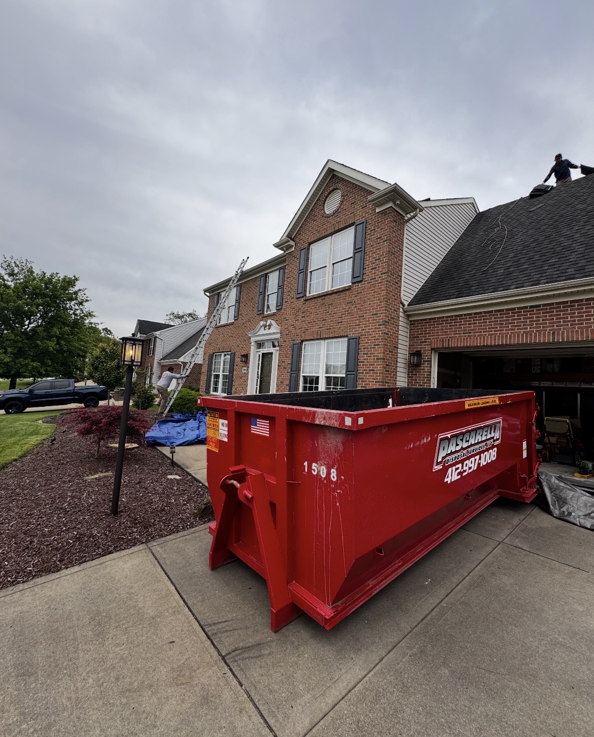 Roll-off dumpster delivered to a Pittsburgh-area driveway